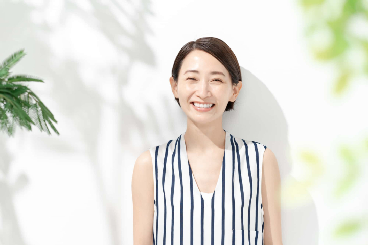 顎関節症を治して笑顔の女性